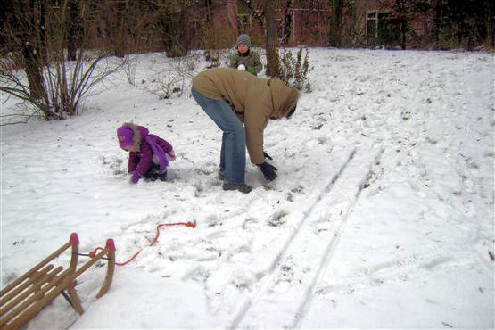 Sneeuwpop maken met papa en Jacquin